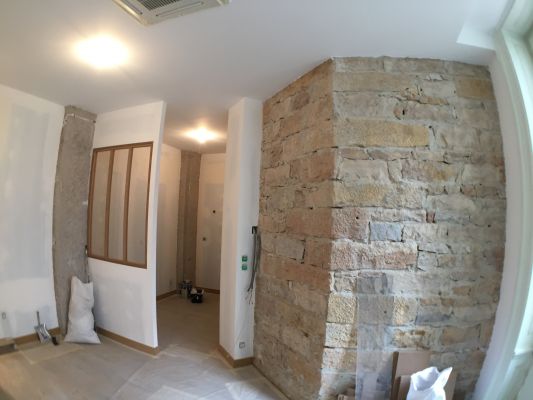 Mur de pierres existant